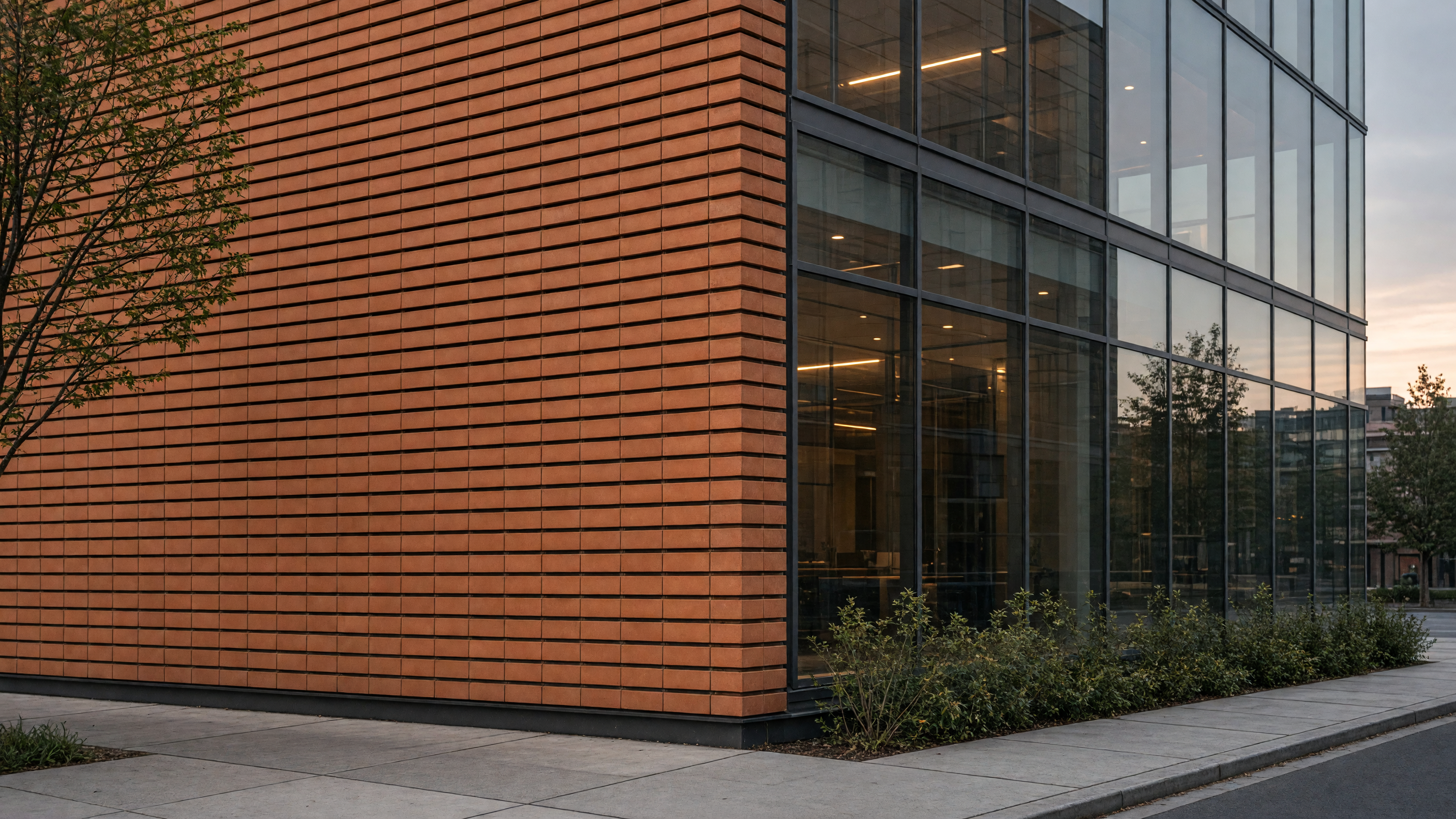 Terracotta tiles meeting the glass at a corner